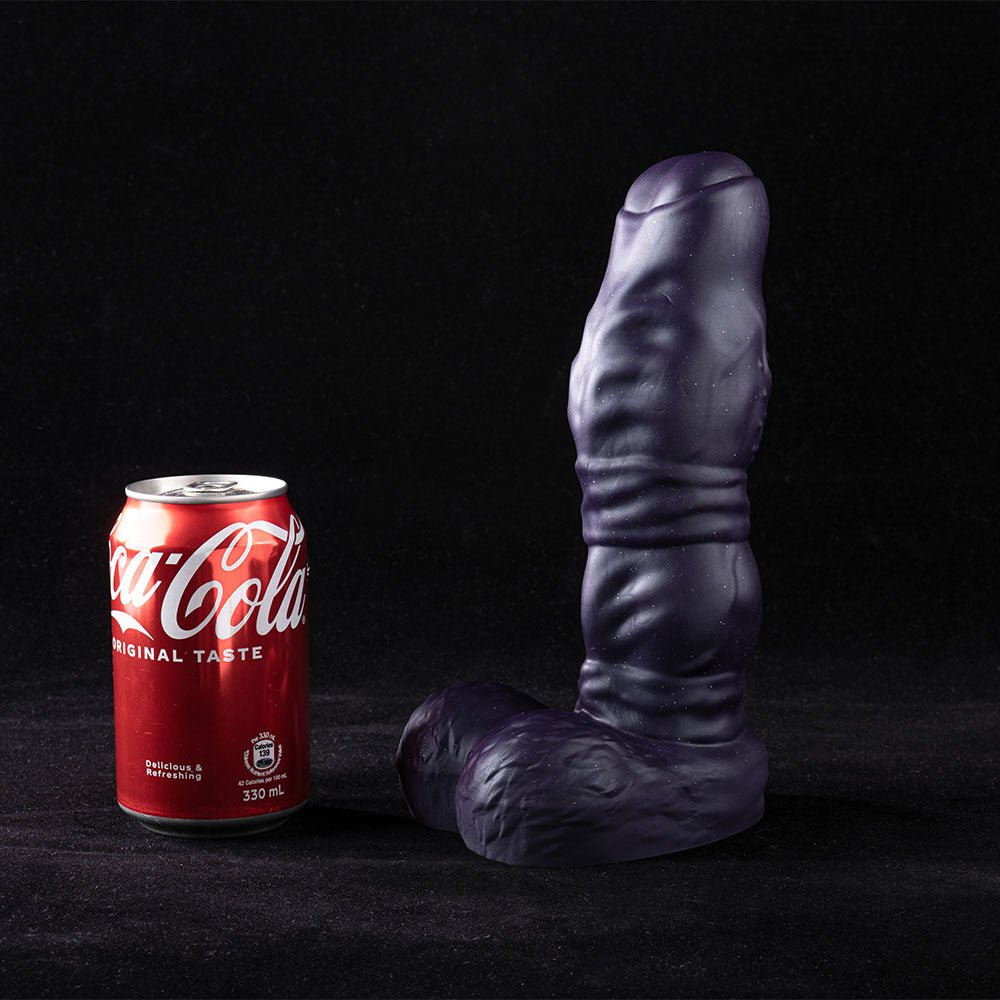 Galactic Twilight fantasy dildo displayed diagonally, showcasing dual knots and nubbed spine against black background.